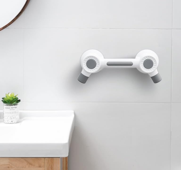Grab bar mounted on the wall beside a bathroom basin
